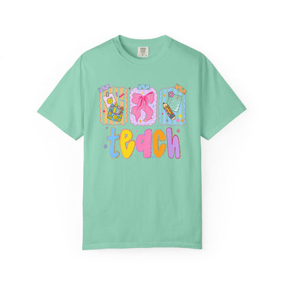 Teacher Gift T‑Shirt — Colorful 'Teach' Classroom Apple & Supplies Design
