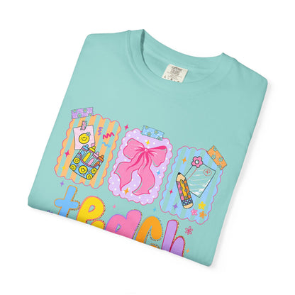 Teacher Gift T‑Shirt — Colorful 'Teach' Classroom Apple & Supplies Design