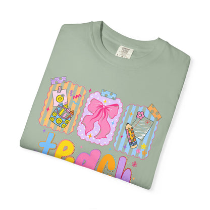 Teacher Gift T‑Shirt — Colorful 'Teach' Classroom Apple & Supplies Design